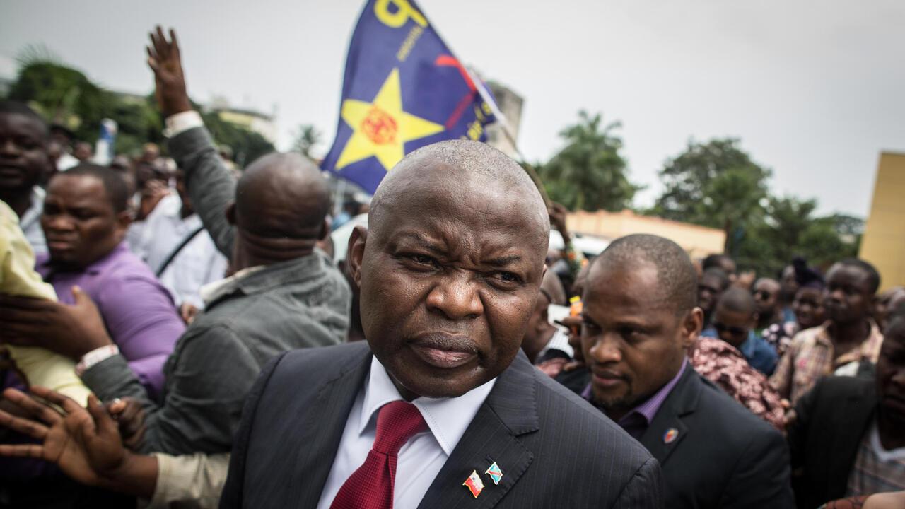 Congolese opposition leader Vital Kamerhe quits the in Cour suprme de Justice (Supreme Court of Justice ) in Kinshasa after that his trial has been postponed. UNC (Union pour la Nation Congolaise) leader is accused by PPRD (Parti du peuple pour la reconstruction et la dmocratie) member Wivine Moleka of electoral fraud in 2011 elections, 23 February 2015 AFP PHOTO/FEDERICO SCOPPA