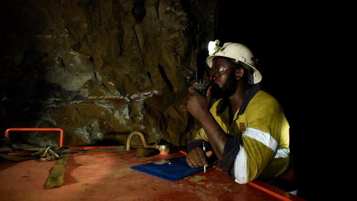 A man works during a rescue operation inside Perkoa mine where water is still being pumped out, four weeks after a flood trapped eight miners inside the galleries, in Perkoa, Burkina Faso, May 13, 2022. REUTERS/Anne Mimault