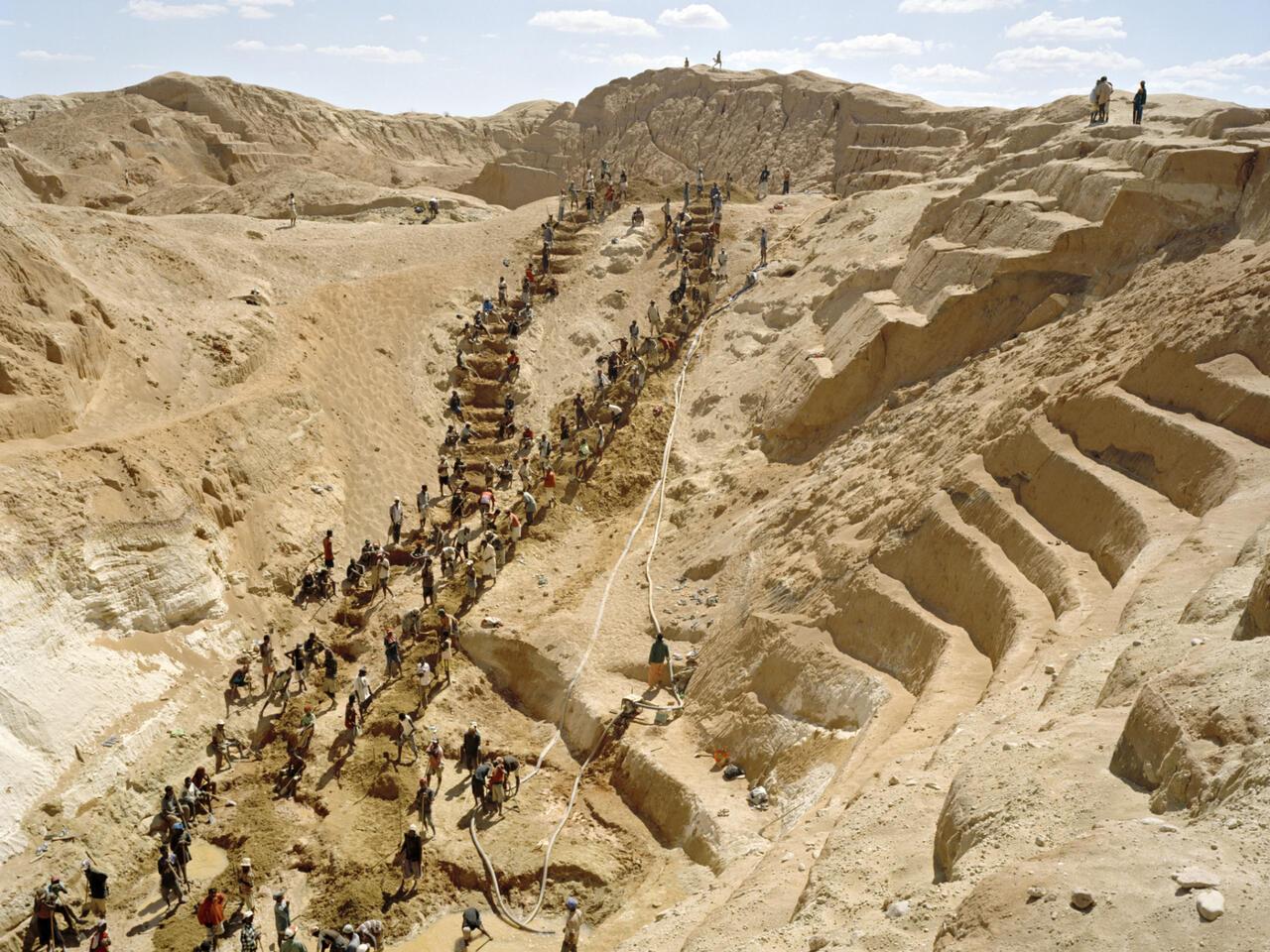 300 men working in a sapphire mine